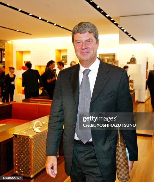 French fashion giant LVMH CEO Yves Carcelle inspects the new shop during a press preview as Louis Vuitton will open a large store in Roppongi Hills,...