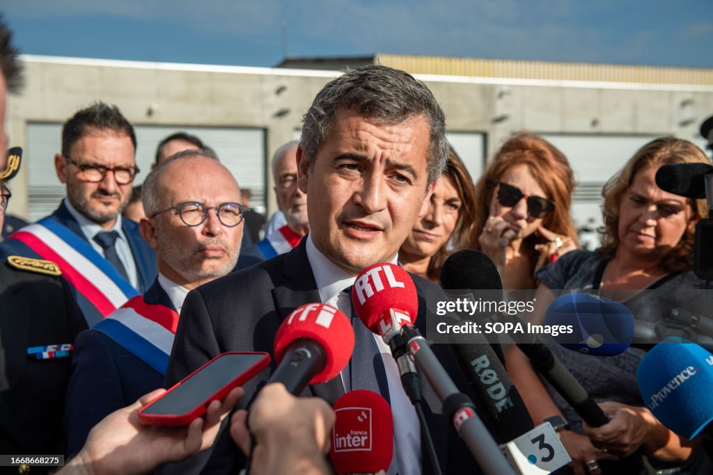 Gerald Darmanin talks to the press...