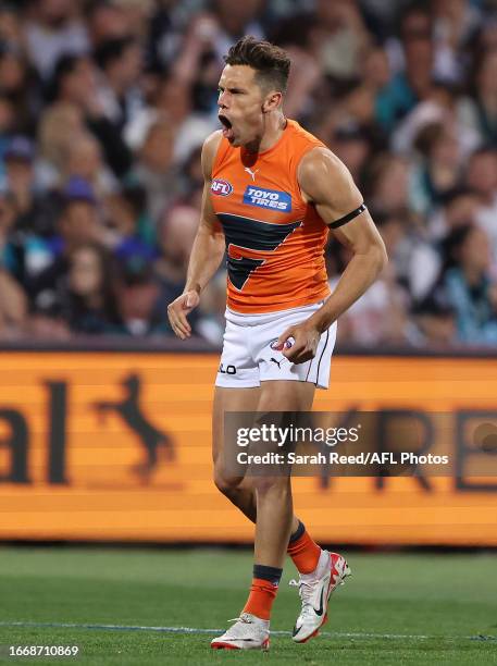 Josh Kelly of the Giants celebrates a goal during the 2023 AFL Second Semi Final match between the Port Adelaide Power and the GWS GIANTS at Adelaide...