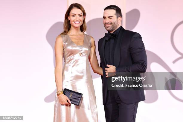 Alejandro Nones and a guest attend a red carpet for the movie "Memory" at the 80th Venice International Film Festival on September 08, 2023 in...