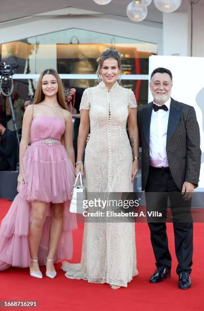 Jennifer Caroletti, Eva Henger and Massimiliano Caroletti attends a red carpet for the movie "Hors-Saison " at the 80th Venice International Film...