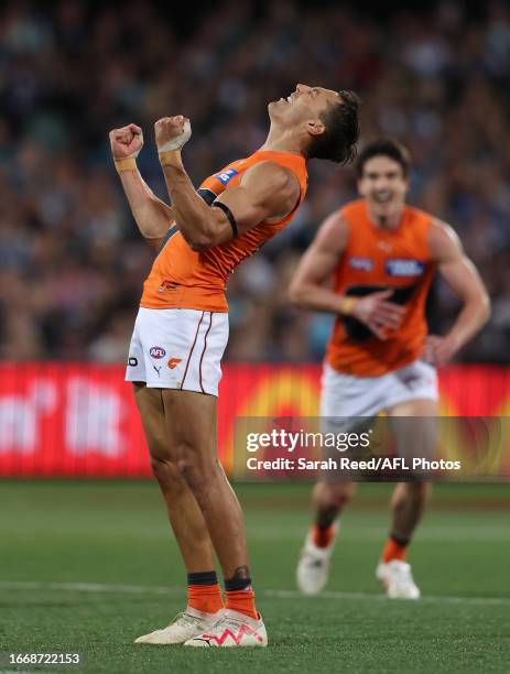 Isaac Cumming of the Giants celebrates a goal during the 2023 AFL Second Semi Final match between the Port Adelaide Power and the GWS GIANTS at...