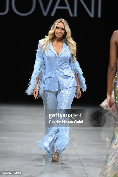 Camille Kostek walks the runway during the JOVANI NYFW SS2024 Show at The Glasshouse on September 08, 2023 in New York City.