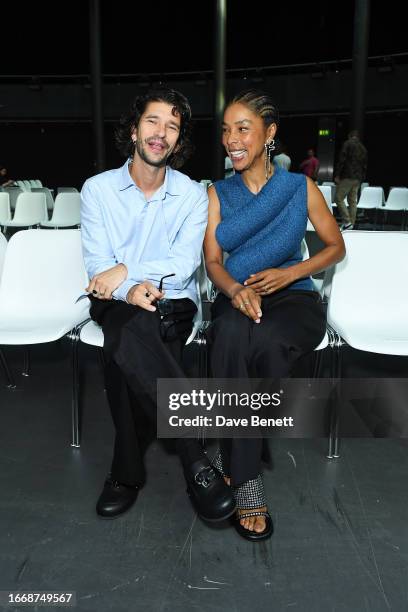 Ben Whishaw and Sophie Okonedo attend the JW Anderson show during London Fashion Week September 2023 at The Roundhouse on September 16, 2023 in...