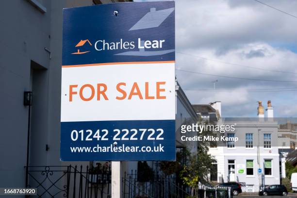 Estate agent for sale sign on 15th September 2023 in Cheltenham, United Kingdom. While the average price of a house in the town is considerably...