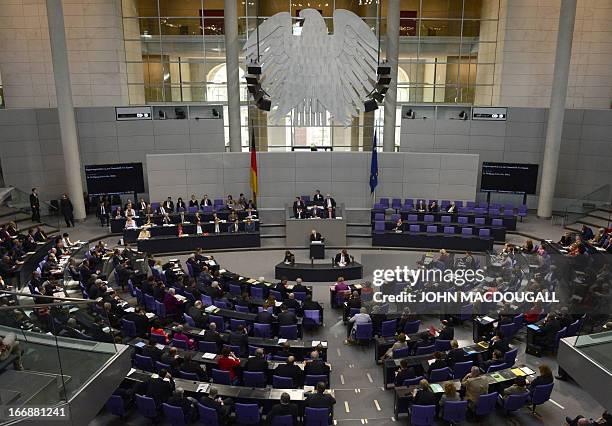 German Finance Minister Wolfgang Schaeuble delivers a speech at the German parliament prior to vote on a bailout package for debt-mired Cyprus, with...