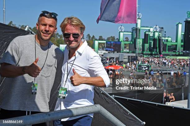 Lukas Podolski and Markus Krampe during the Gluecksgefuehle Festival at Hockenheimring on September 16, 2023 in Hockenheim, Germany.