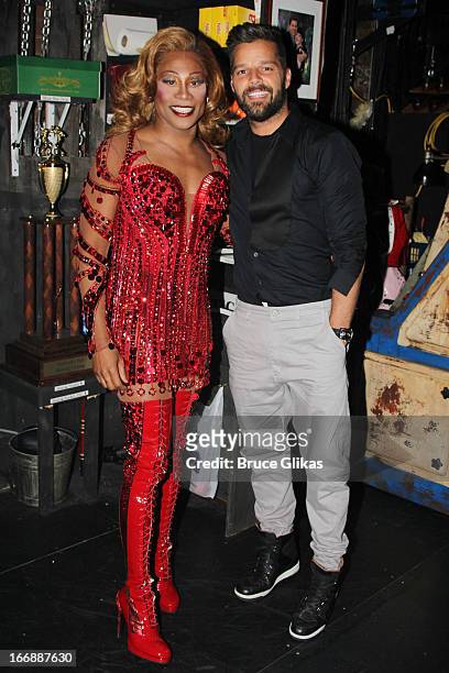Billy Porter as "Lola" and Ricky Martin pose backstage at the hit musical "Kinky Boots" on Broadway at The Al Hirshfeld Theater on April 17, 2013 in...