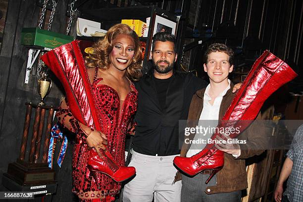 Billy Porter as "Lola", Ricky Martin and Stark Sands as "Charlie" pose backstage at the hit musical "Kinky Boots" on Broadway at The Al Hirshfeld...