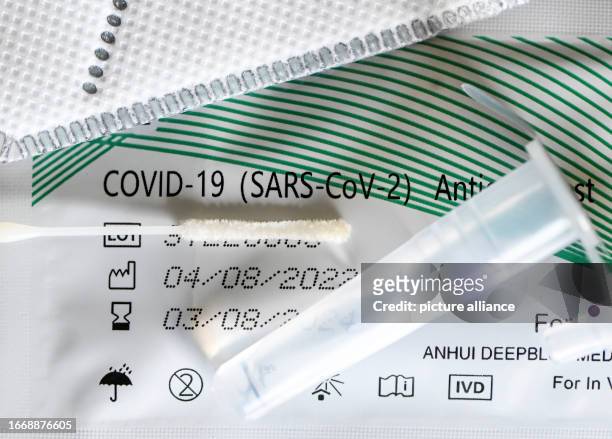 September 2023, Berlin: An antigen test to detect Covid-19 for self-testing is on an FFP-2 mask. For a long time, Corona was no longer a big issue....