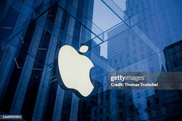 The Logo of Apple lights up on a building on September 16, 2023 in New York City, United States.