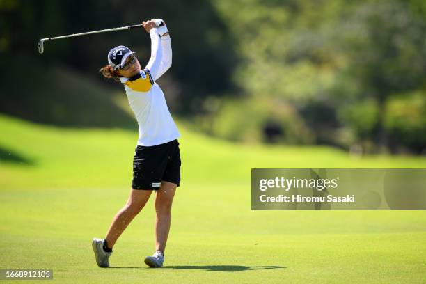 Sakura Yokomine of Japan hits her second shot on the 11th hole during the third round of the JLPGA Championship Konica Minolta Cup at Passage Kinkai...