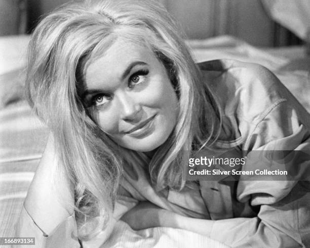 English actress Shirley Eaton as Jill Masterson in the James Bond film 'Goldfinger', directed by Guy Hamilton, 1964.
