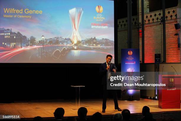 Master of Ceremony, Wilfred Genee speaks during the UEFA Europa League trophy handover ceremony at Beurs van Berlage on April 18, 2013 in Amsterdam,...