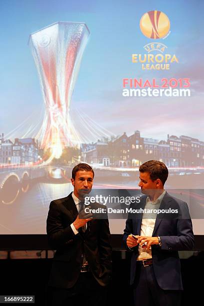 Master of Ceremony, Wilfred Genee and Athletico Madrid player, Gabi speak to the media and guests during the UEFA Europa League trophy handover...