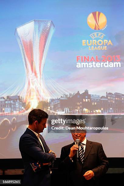 Master of Ceremony, Wilfred Genee and Enrique Cerezo, Athletico Madrid President speak to the media and guests during the UEFA Europa League trophy...