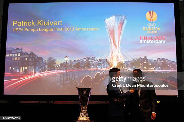 Master of Ceremony, Wilfred Genee and Patrick Kluivert, former player and UEFA Europa League Final 2013 Ambassador speak to the media and guests...