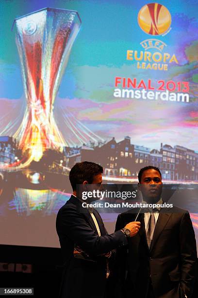 Master of Ceremony, Wilfred Genee and Patrick Kluivert, former player and UEFA Europa League Final 2013 Ambassador speak to the media and guests...