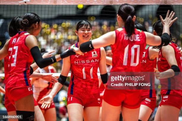 Japan's Nichika Yamada reacts during the Volleyball World Cup 2023 Women's match between Japan and Peru at Yoyogi National Stadium in Tokyo on...