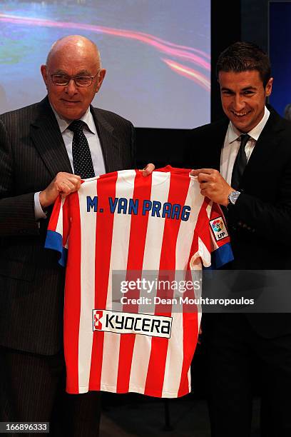 Michael van Praag , KNVB President is presented with a shirt by Athletico Madrid player, Gabi during the UEFA Europa League trophy handover ceremony...