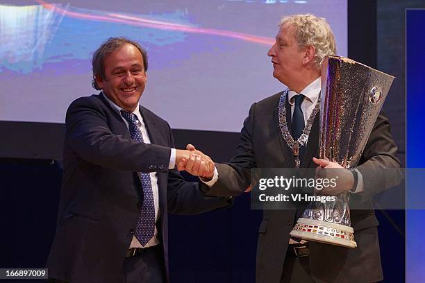 Michel Platini, burgermeester Eberhard van der Laan during the UEFA Europa League trophy handover ceremony on April 18, 2013 at Amsterdam, The...