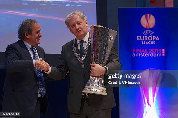 Michel Platini, burgermeester Eberhard van der Laan during the UEFA Europa League trophy handover ceremony on April 18, 2013 at Amsterdam, The...