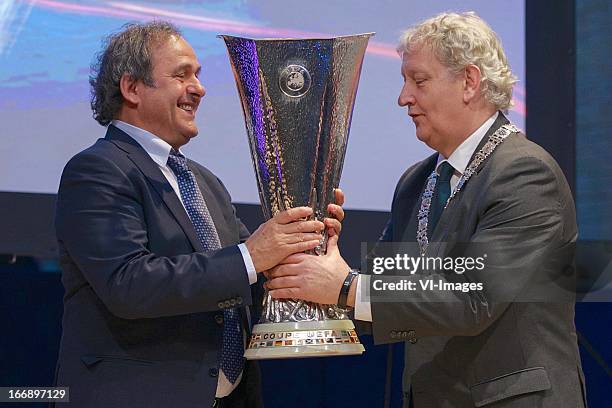 Michel Platini, burgermeester Eberhard van der Laan during the UEFA Europa League trophy handover ceremony on April 18, 2013 at Amsterdam, The...