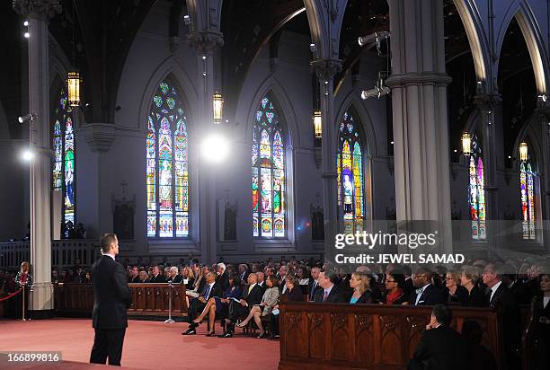 President Barack Obama and First Lady Michelle Obama attend the "Healing Our City: An Interfaith Service" dedicated to those who were gravely wounded...