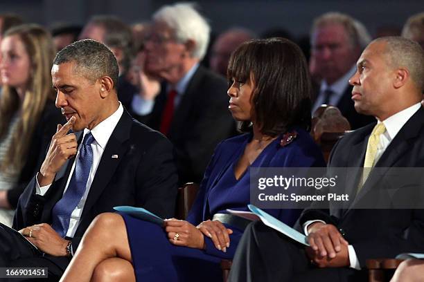 President Barack Obama, first lady Michelle Obama and Massachusetts Gov. Deval Patrick attend an interfaith prayer service for victims of the Boston...