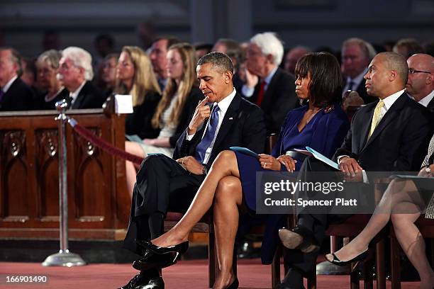 President Barack Obama, first lady Michelle Obama and Massachusetts Gov. Deval Patrick attend an interfaith prayer service for victims of the Boston...