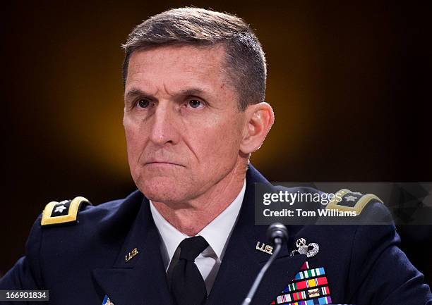 Army Lt. Gen. Michael Flynn, director of the Defense Intelligence Agency, prepares to testify at a Senate Armed Services Committee hearing in Dirksen...