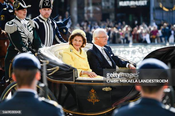 King Carl XVI Gustaf of Sweden and Queen Silvia of Sweden arrive in a carriage for festivities to celebrate the 50th anniversary of King Carl XVI...