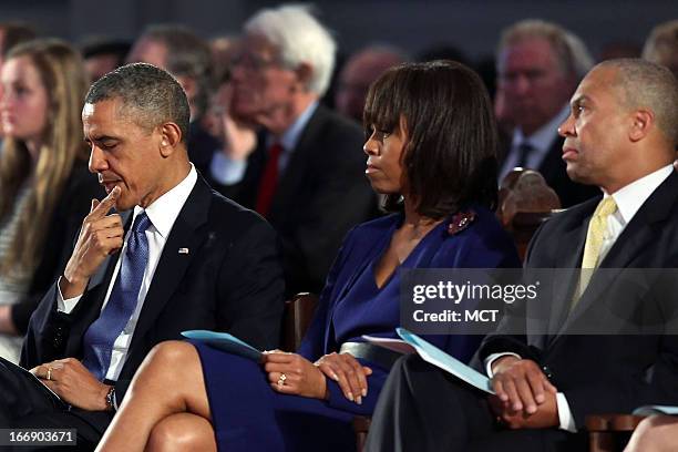 President Barack Obama and first lady Michelle Obama attend an interfaith prayer service, along side Massachusetts Gov. Deval Patrick, for victims of...