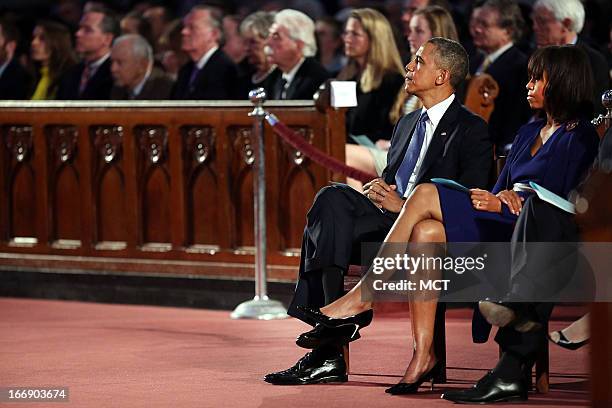 President Barack Obama and first lady Michelle Obama attend an interfaith prayer service for victims of the Boston Marathon attack titled "Healing...