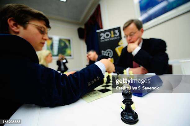 International Master Sam Sevian shares chess tips with former representative Jim Talent during a special event held at United States Capitol Building...