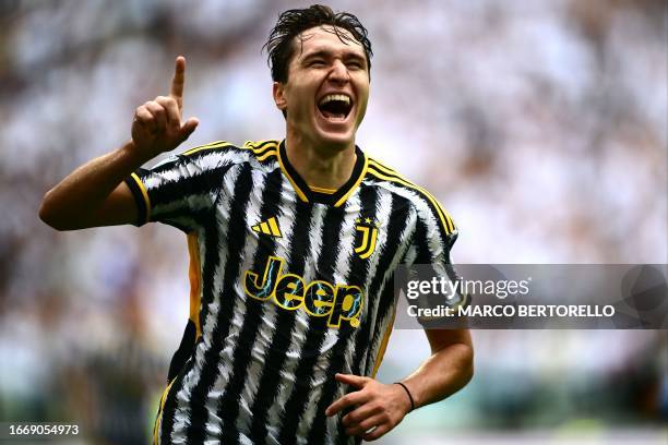 Juventus' Italian forward Federico Chiesa celebrates after scoring his team's second goal during the Italian Serie A football match between Juventus...
