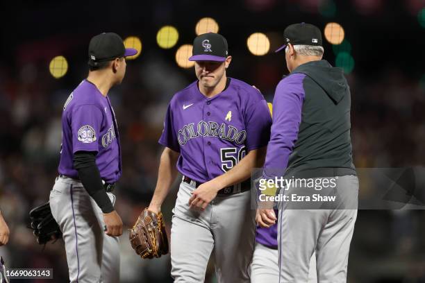 Ty Blach of the Colorado Rockies is taken out of the game by manager Bud Black after he gave up three home runs in a row to the San Francisco Giants...