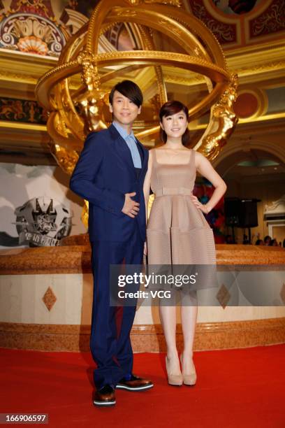 Singers David Tao and Sharon Kwan arrive at the red carpet of the 17th Channel V Chinese Music Awards at Venetian Theatre on April 18, 2013 in Macau,...