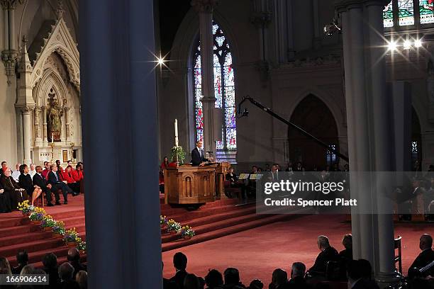 President Barack Obama speaks st an interfaith prayer service for victims of the Boston Marathon attack titled "Healing Our City," at the Cathedral...