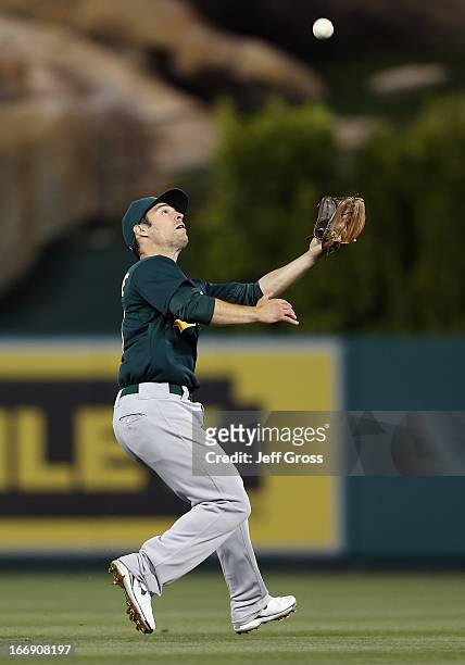 Second baseman Scott Sizemore of the Oakland Athletics fields a pop fly against the Los Angeles Angels of Anaheim at Angel Stadium of Anaheim on...
