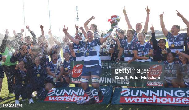 Eloise Blackwell of Auckland holds aloft the Farah Palmer cup as her team celebrates the win during the Farah Palmer Cup Premiership Final match...