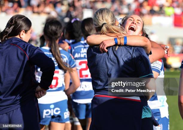 Mel Puckett of Auckland hugs a team member after the 39-27 win over Canterbury during the Farah Palmer Cup Premiership Final match between Canterbury...