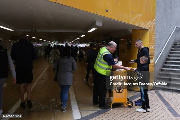 Programme seller during the Premier League match between Wolverhampton Wanderers and Liverpool FC at Molineux on September 16, 2023 in Wolverhampton,...