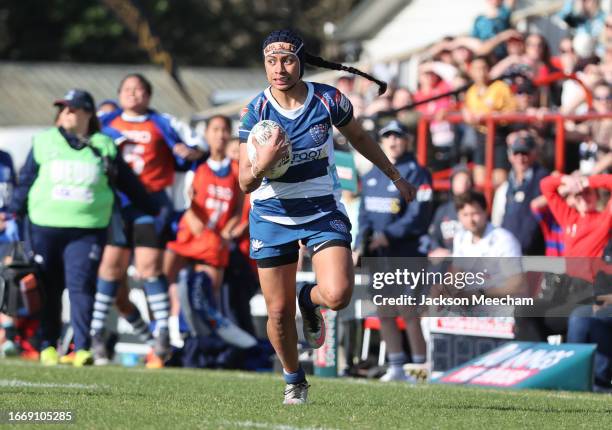 Angelica Vahai of Auckland runs up the edge during the Farah Palmer Cup Premiership Final match between Canterbury and Auckland at Rugby Park, on...