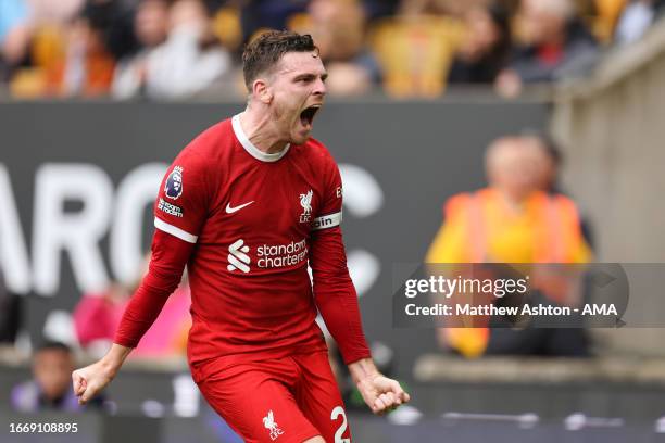 Andrew Robertson of Liverpool celebrates after scoring a goal to make it 1-2 during the Premier League match between Wolverhampton Wanderers and...