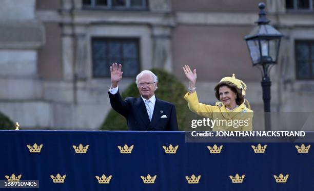 King Carl XVI Gustaf of Sweden and Queen Silvia of Sweden wave during festivities to celebrate the 50th anniversary of Sweden's King Carl XVI...
