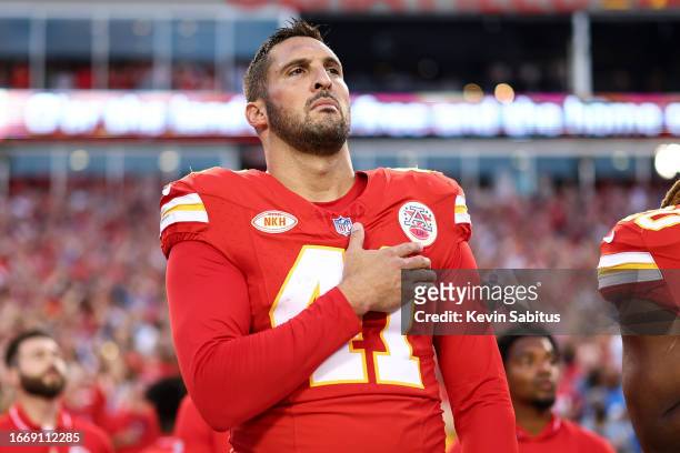 James Winchester of the Kansas City Chiefs stands on the sidelines during the national anthem prior to an NFL football game against the Detroit Lions...