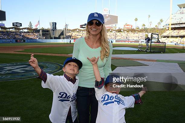 In this handout photo provided by the LA Dodgers, Britney Spears poses with sons Jayden James Federline and Sean Preston Federline during agame...