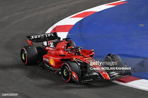 Ferrari's Monegasque driver Charles Leclerc drives during the qualifying session of the Singapore Formula One Grand Prix night race at the Marina Bay...