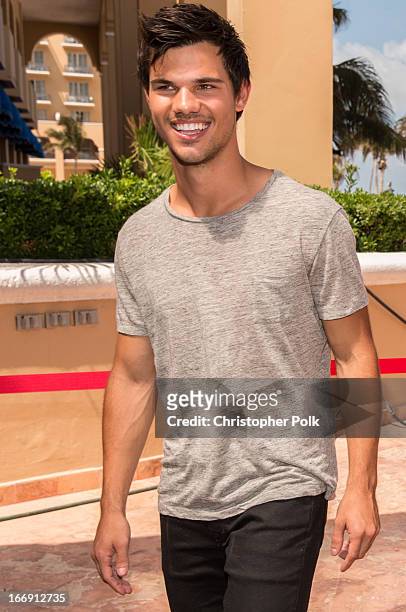Actor Taylor Lautner attends the "Grown Ups 2" Photo Call at The 5th Annual Summer Of Sony at the Ritz Carlton Hotel on April 18, 2013 in Cancun,...